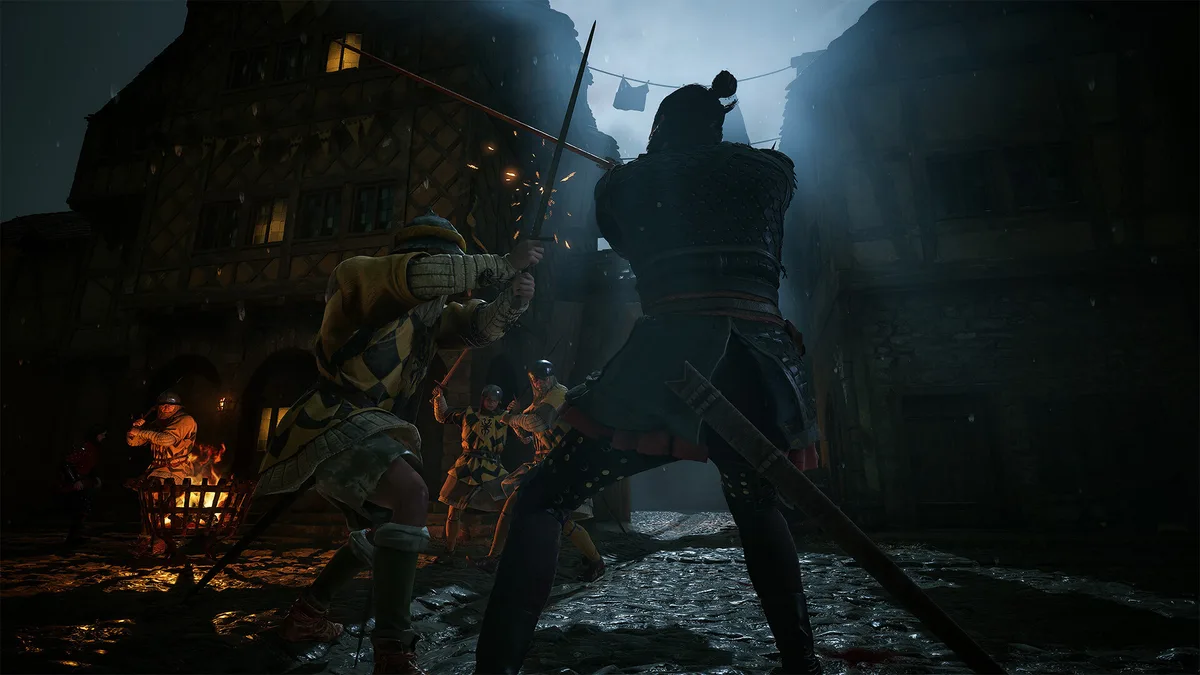 Coen dueling Ambrus at night in a sword clash in The Blood of Dawnwalker